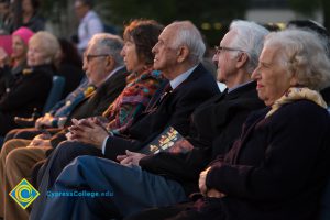 Holocaust survivors sitting together at Yom HaShoah