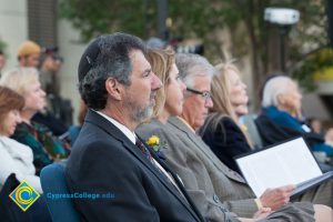 Cliff Lester watching Yom HaShoah event