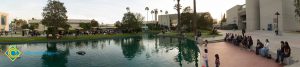 Attendees gathered around the pond at Yom HaShoah event