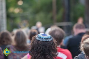 The back of a man wearing a yarmulke