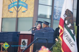 Student in regalia wins award onstage at commencement