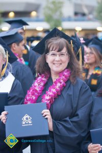 Student in graduation regalia at commencement