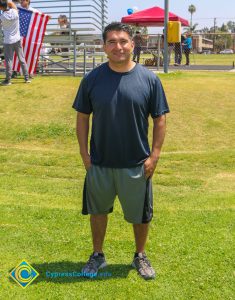 Juan Garcia in athletic wear standing on lawn