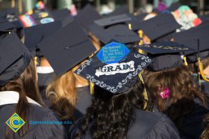 A graduation cap reads "She believed she could so she did! For you, Kaylie"