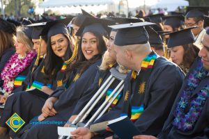 Students sit in the audience at commencement