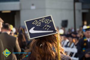 A graduation cap reads "Just Did It!"