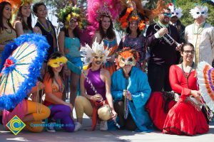 Students dressed in costume for Mardi Gras parade.