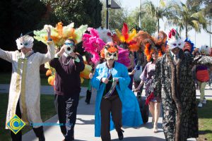 Masked participants of the Mardi Gras parade.