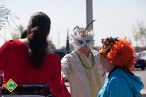 Man with a masquerade mask.