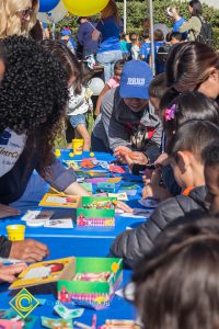 Children gathered at an activity table.