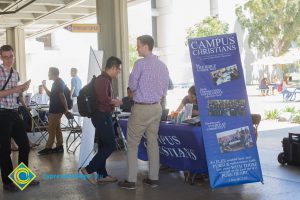 Campus Christians table at Welcome Back event.