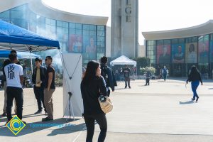 Students walking the gateway plaza.