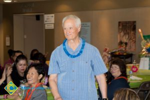 Male employee at end-of-the-year luau