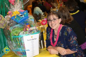 Raffle basket winner at end-of-the-year luau