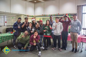 Group of students at the International Club Holiday party.