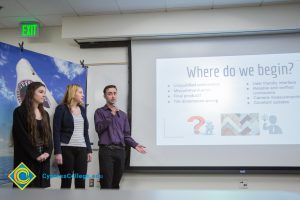 Group of three students presenting at the Fall 2018 Shark Tank.