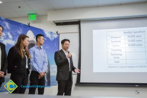 Group of four students presenting at the Fall 2018 Shark Tank.