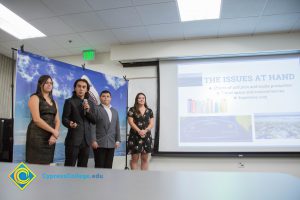 Group of four students presenting at the Fall 2018 Shark Tank.