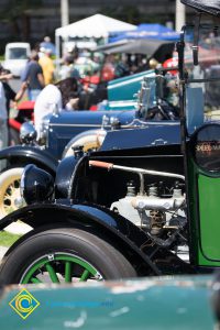 A row of antique cars.