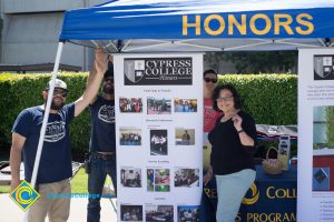 Staff at the Honors Program booth for the 50th anniversary celebration.