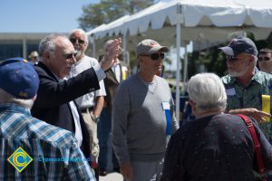 A group of men at the Cypress College 50 Anniversary Festival and Reunion.