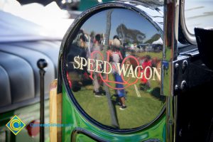 Vintage auto with REO Speed wagon sticker on the mirror.