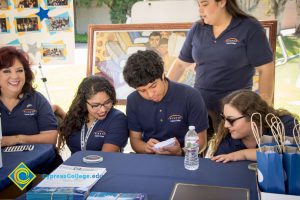 Puente students and a smiling Dr. Mosqueda-Ponce.