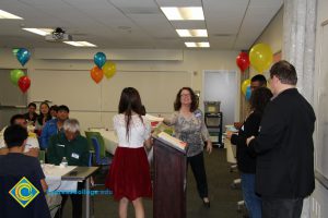 Students enjoying the 2014 ESL Scholarship Potluck.