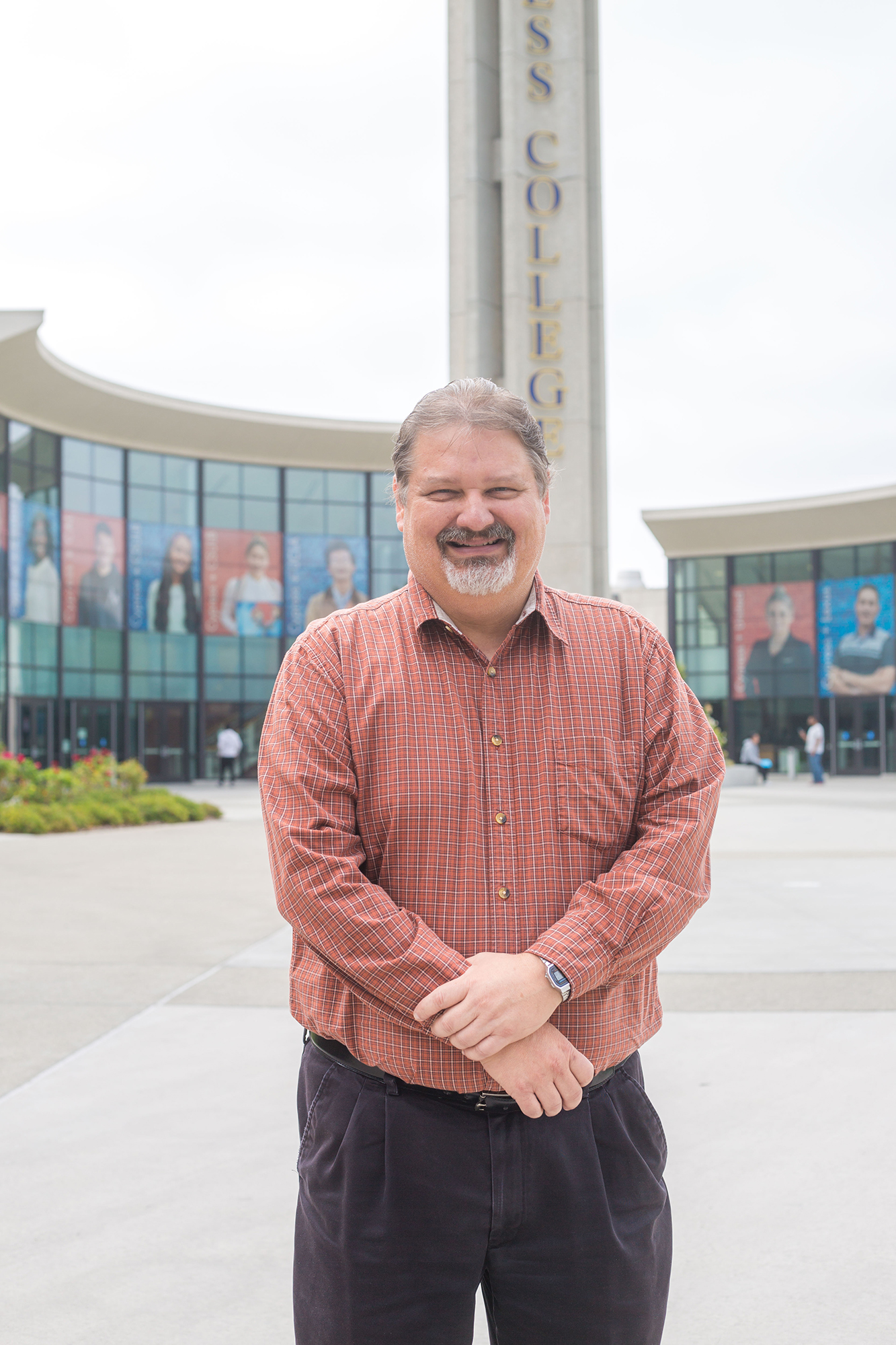 Institutional Research Director Philip Dykstra Stands in Front of Campanile