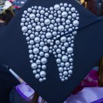 Decorated graduation cap with a bling tooth