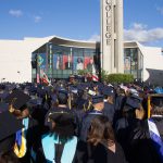 Large crowd of graduates during commencement.