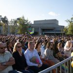 Crowd of seated guests during commencement.