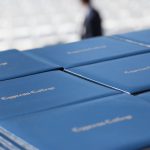 Stacks of diploma covers.