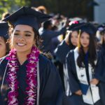 Students walking the commencement processional.