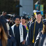 Students walking the commencement processional.