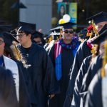 Students walking the commencement processional.