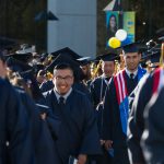 Students walking the commencement processional.