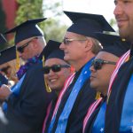 Students in their cap and gown during commencement ceremony.