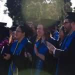 Students in their cap and gown during commencement.