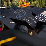Decorated and plain graduation caps.