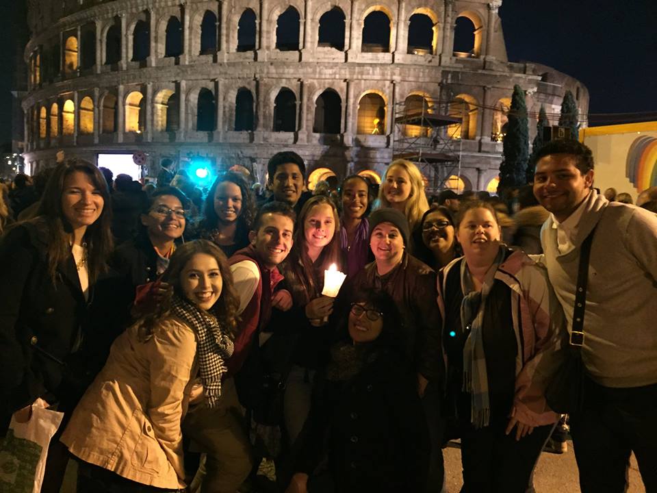 Students standing in front of the Colosseum in Rome
