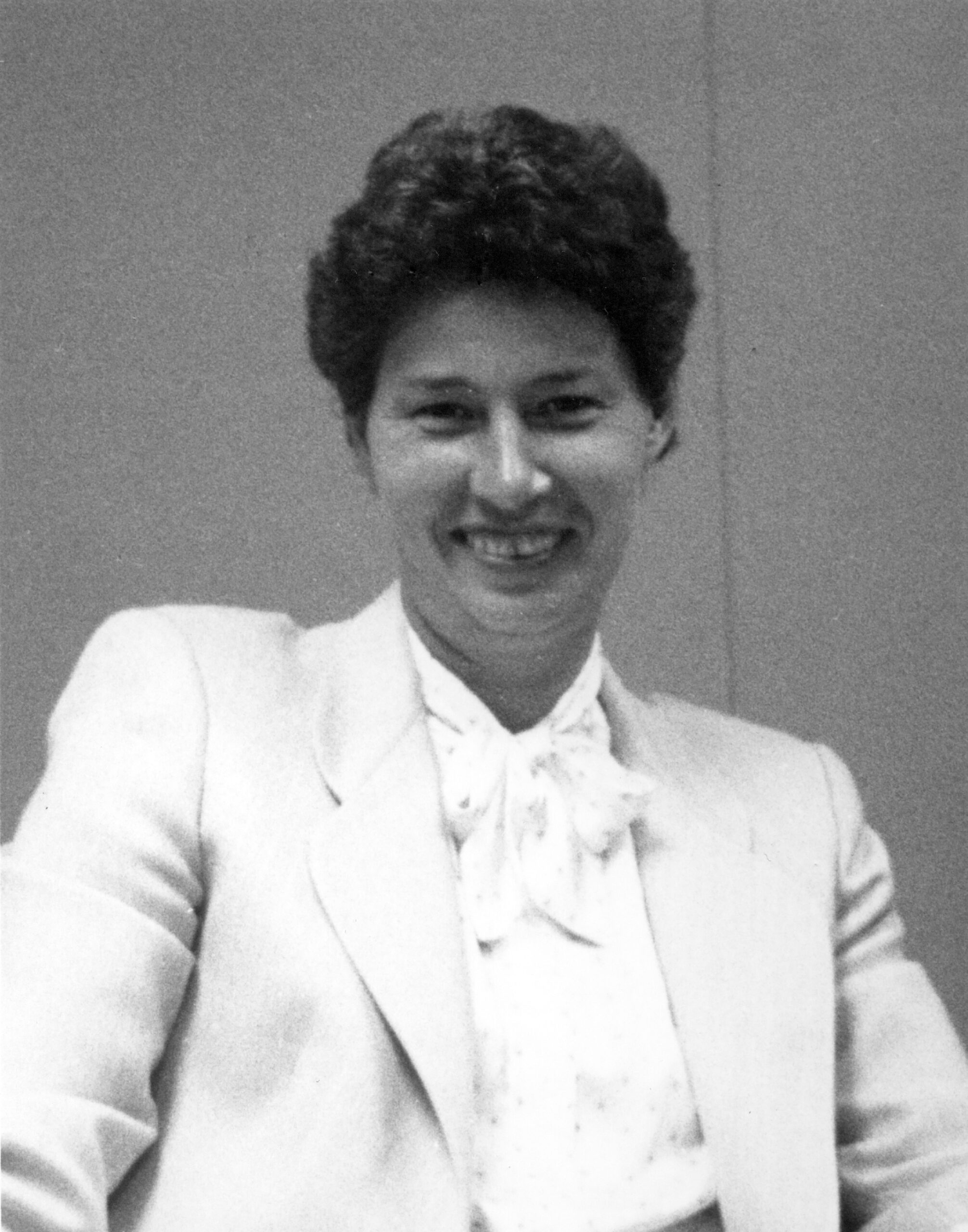 A 1970s or 1980s black-and-white portrait of a woman.