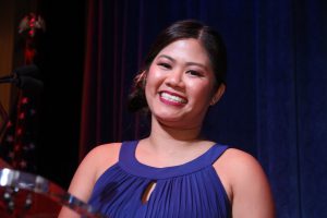 Young lady smiling at 42nd Americana Awards