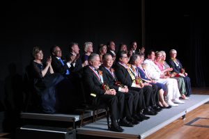 42nd Americana awardees seated on stage.