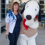 Woman smiling with Snoopy