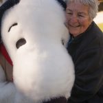 Woman hugging Snoopy