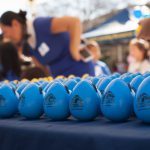 Blue promotional eggs with Charger logo on display at Kindercaminata