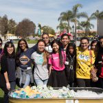 Students on the lawn during Senior Day