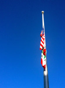 Cypress College's main flag flies at half staff on Thursday, September 11, 2014 — the 13th anniversary of the 9/11 attacks on the United States.