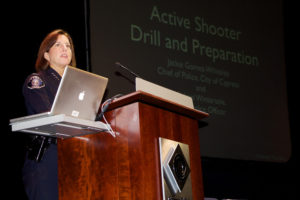 Cypress Police Chief Jackie Gomez-Whiteley speaks to Cypress College employees at the Opening Day meeting.